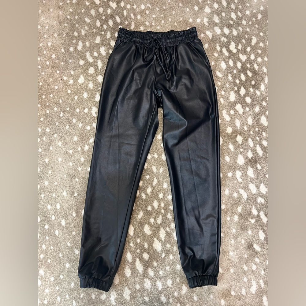 Love these but they are just too long for me!! Black faux pants. Size small!